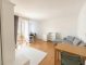 Zentrale Eigentumswohnungen mit Balkon und Garage - Wohnzimmer mit Balkon
